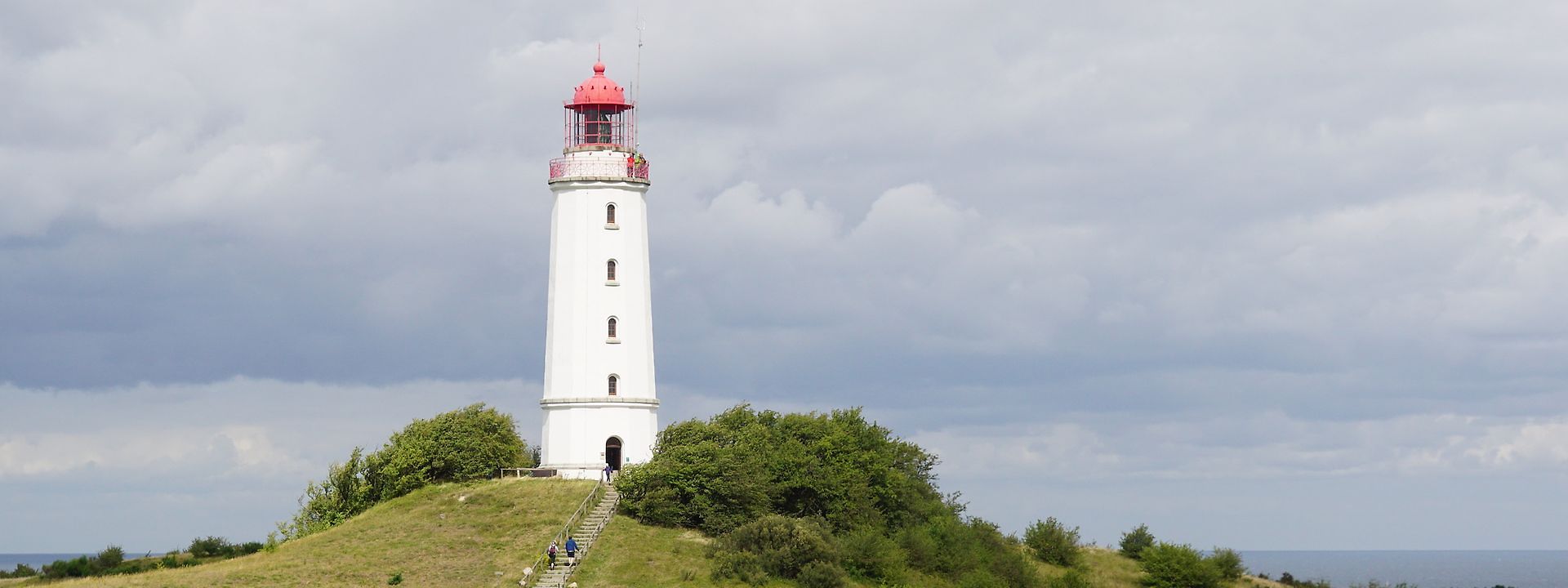 Lighthouse under a cloudy sky 