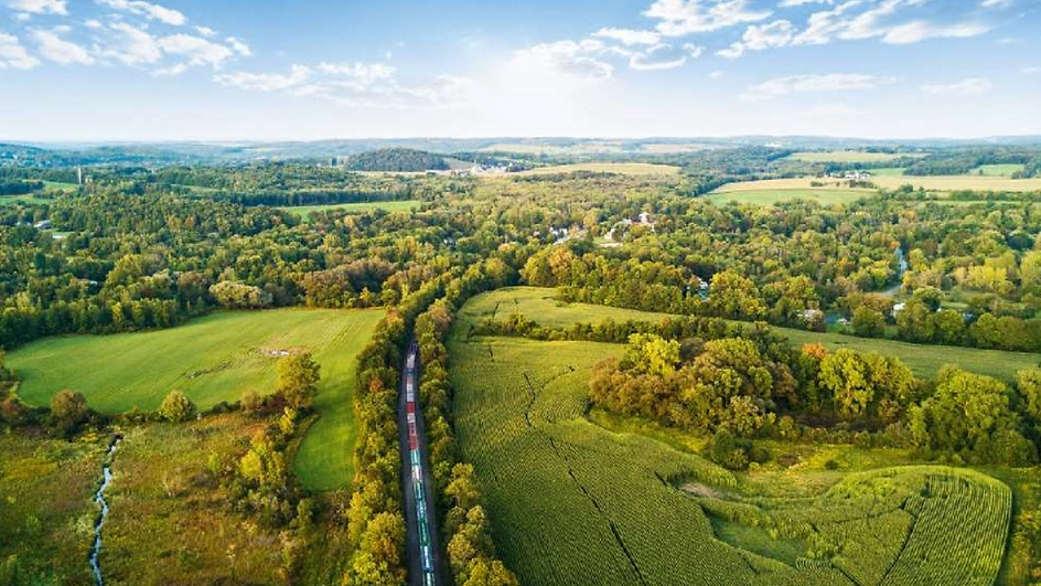 Aerial view of a freight train in a landscape 